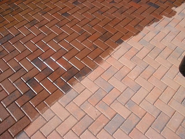 pressure washing a brick patio